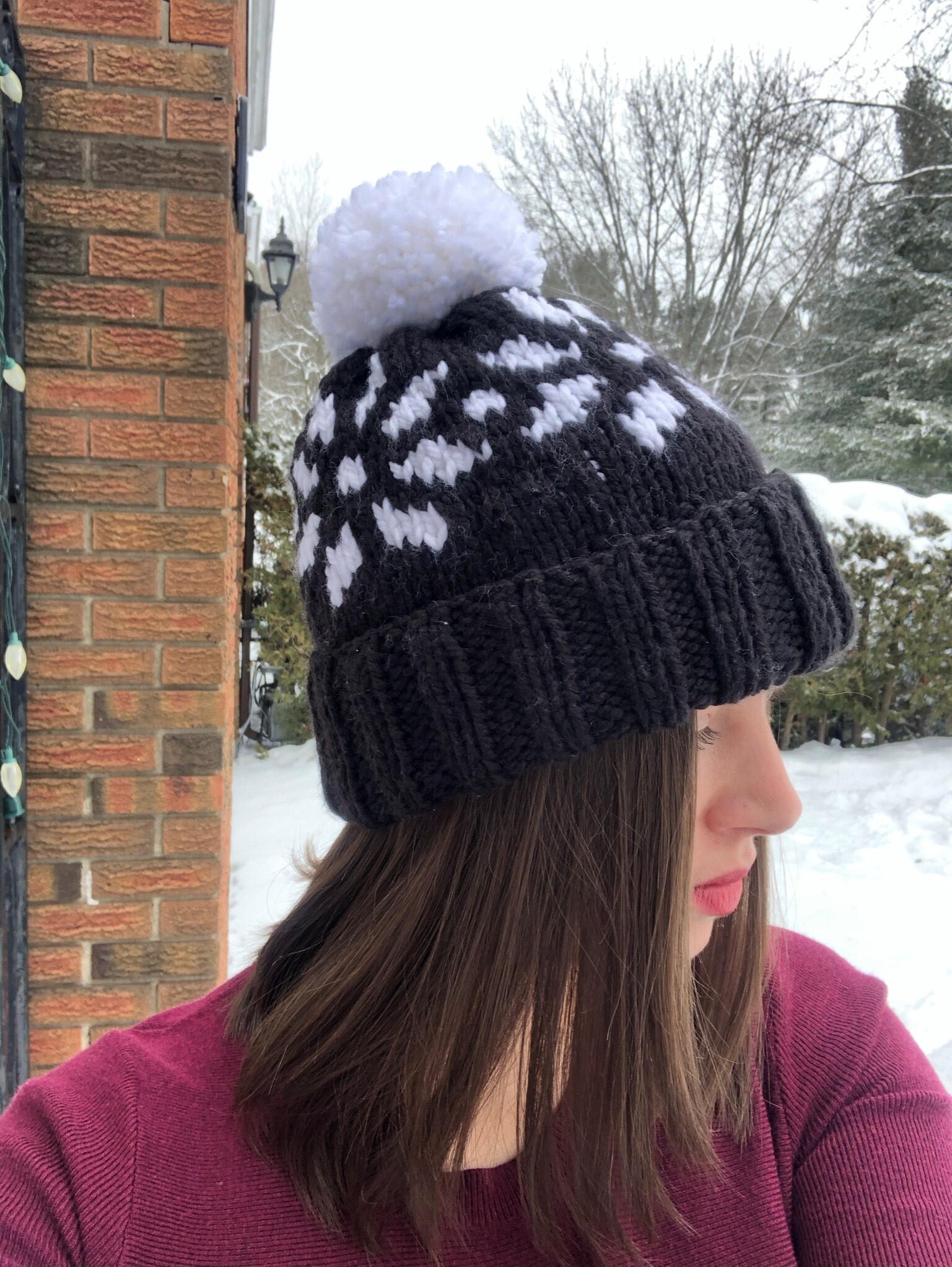 Photo of woman in handmade knit hat